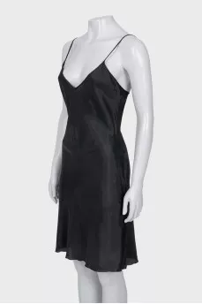 A fitted dress with thin straps