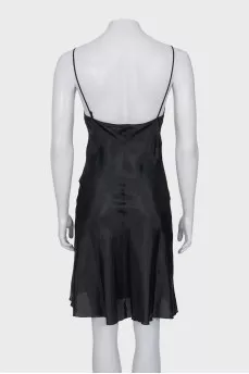 A fitted dress with thin straps