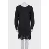 Dress with lace at the hem