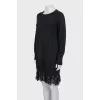 Dress with lace at the hem