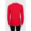 Red sweatshirt with a signature print