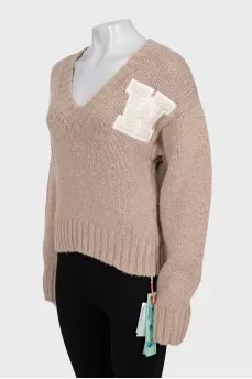 Knitted brown sweater with tag