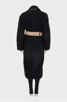 Fitted fur coat with pockets