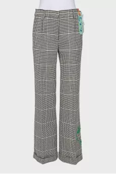 Wide-leg, mid-rise trousers with a printed pattern