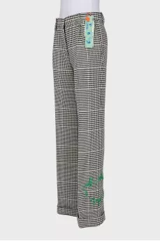 Wide-leg, mid-rise trousers with a printed pattern