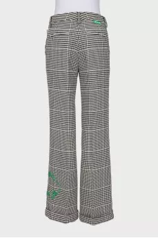 Wide-leg, mid-rise trousers with a printed pattern