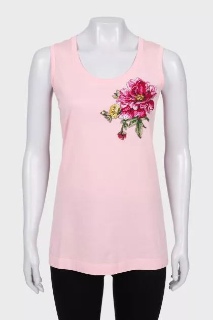 T-shirt with embroidered flower and tag