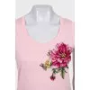 T-shirt with embroidered flower and tag