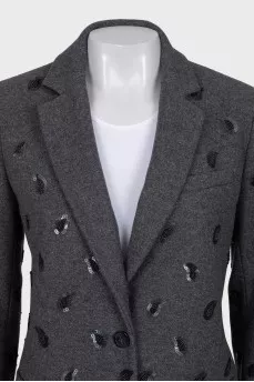 Fitted coat decorated with sequins