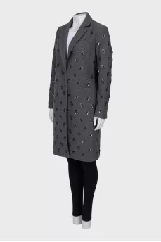 Fitted coat decorated with sequins
