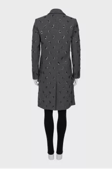 Fitted coat decorated with sequins