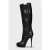 Leather boots with textile inserts