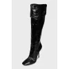 Black glossy boots
