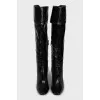 Black glossy boots