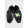 Black glossy boots