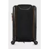 Suitcase made of textile and plastic