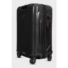 Suitcase made of textile and plastic