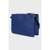 Blue leather bag with decoration