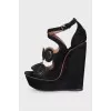 Suede sandals with shaped elements
