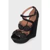 Suede sandals with shaped elements