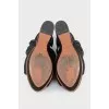 Suede sandals with shaped elements
