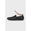Leather loafers with gold hardware