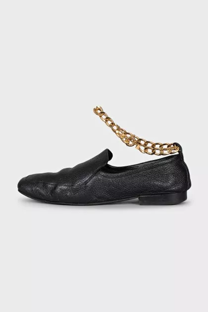 Leather loafers with gold hardware