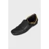 Leather loafers with gold hardware