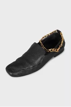 Leather loafers with gold hardware