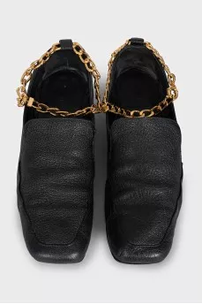 Leather loafers with gold hardware