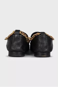 Leather loafers with gold hardware