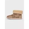 Textile boots with a brand monogram
