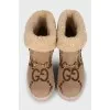 Textile boots with a brand monogram