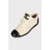 White leather sneakers with contrasting inserts