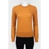 Fading sweater with beads