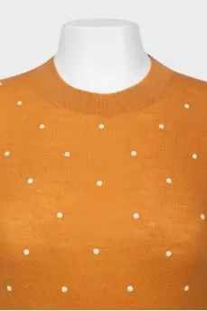 Fading sweater with beads