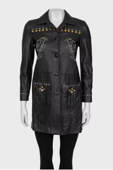 Leather jacket decorated with rivets and crystals