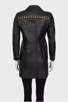 Leather jacket decorated with rivets and crystals