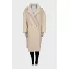 Beige fur coat with long pile