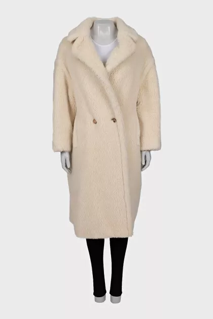 Beige fur coat with long pile