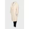 Beige fur coat with long pile