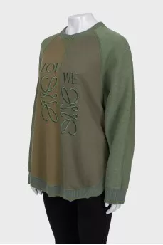 Green sweatshirt with embroidered logo
