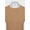 A top and skirt suit with gold thread