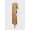 A top and skirt suit with gold thread