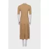 A top and skirt suit with gold thread