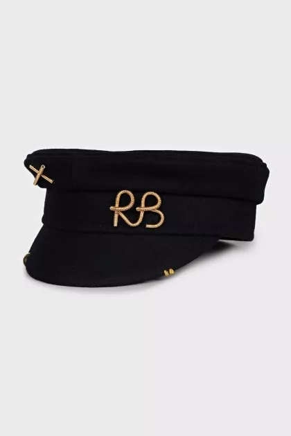 Wool cap with metal decoration