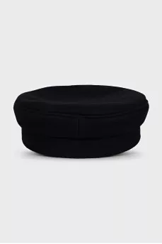 Wool cap with metal decoration