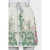 Denim mini skirt decorated with embroidery