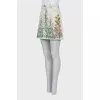 Denim mini skirt decorated with embroidery
