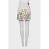 Denim mini skirt decorated with embroidery